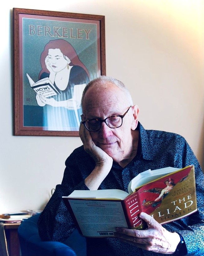 Bob dixon at his desk reading