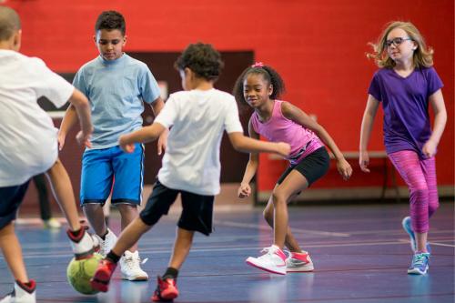 kids playing indoor soccer