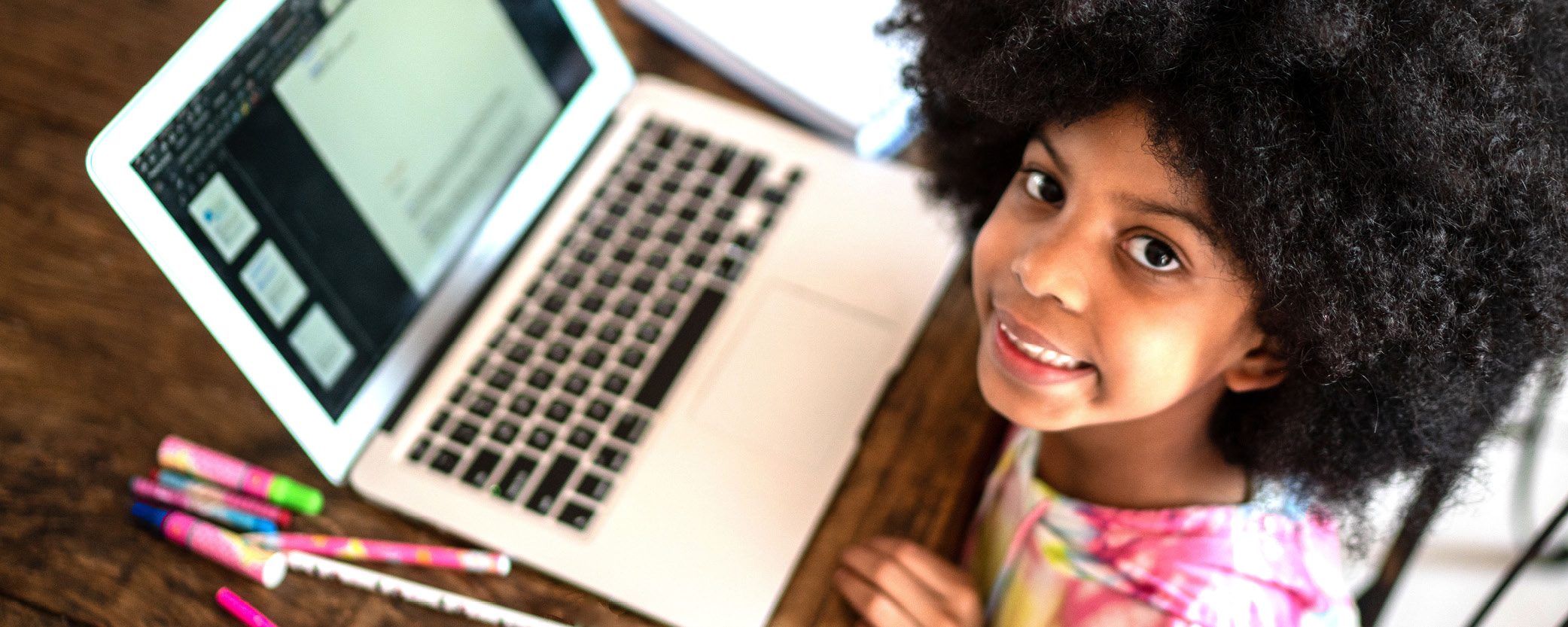 student in front of a computer